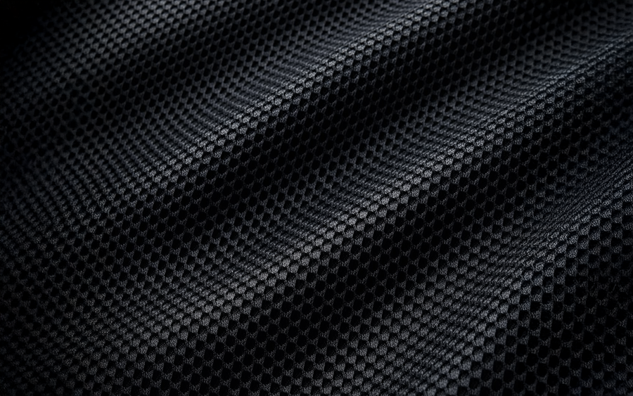 Poly-mesh sweat-wicking lining at impact areas
